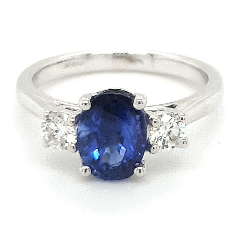 18ct White Gold Sapphire and Three Stone Diamond Ring